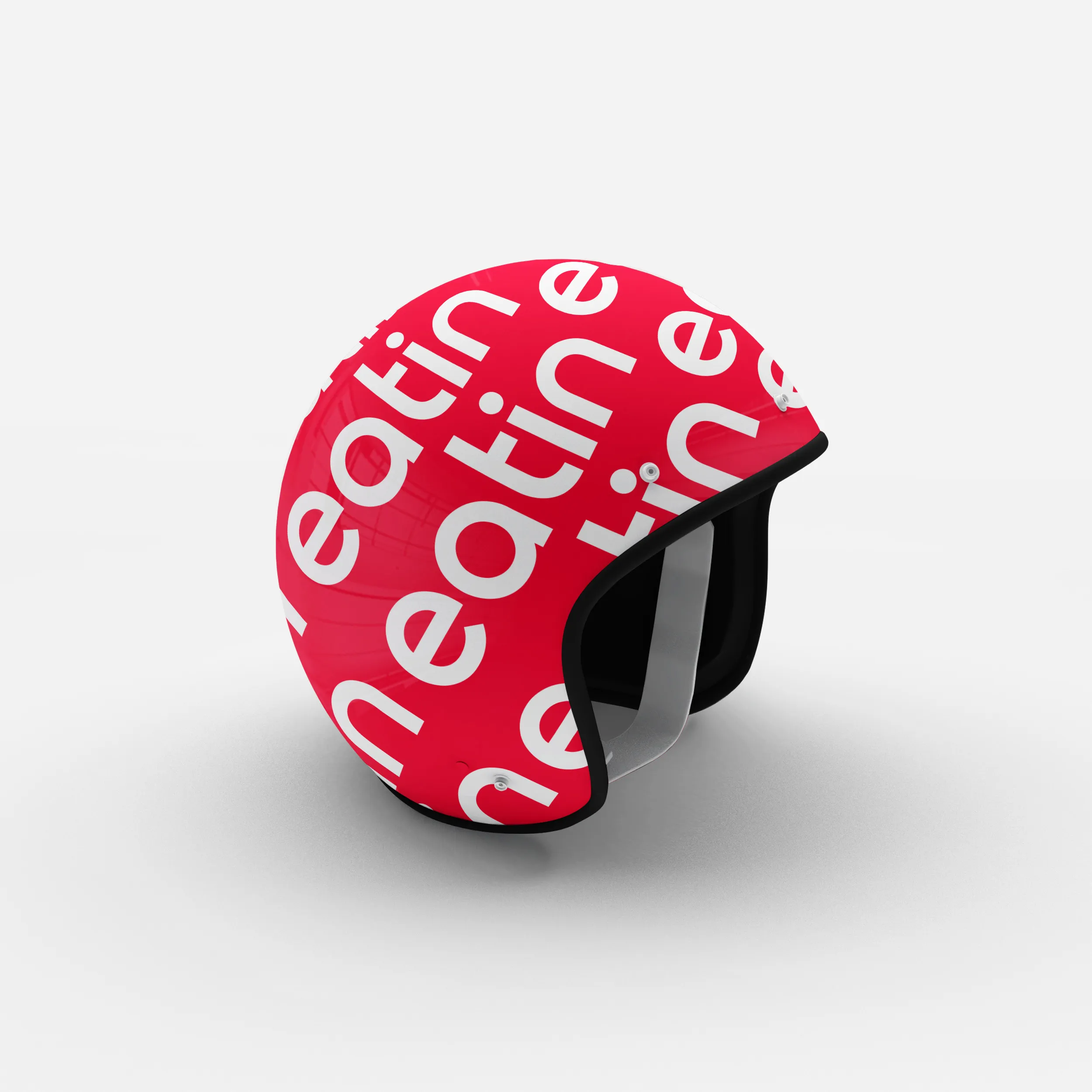 Mockup of a red open-face rider helmet covered in rows of the white eatin wordmark set on a diagonal, with a clear visor
