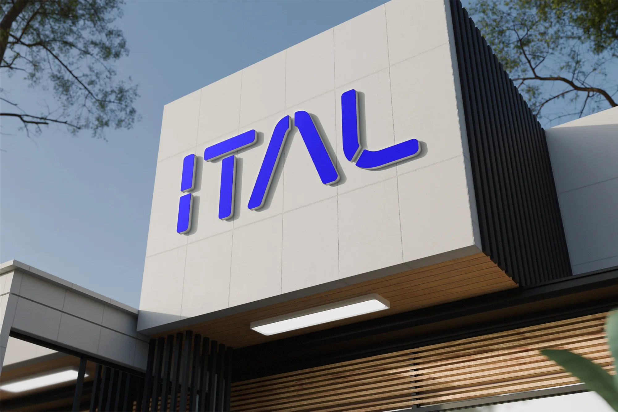 3D render of the ITAL logo in blue relief letters on a white building facade