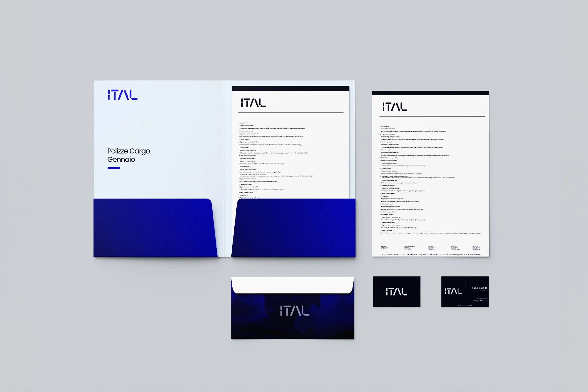 Mockup of ITAL stationery: an open folder, letterheads, an envelope and two business cards in white and deep blue
