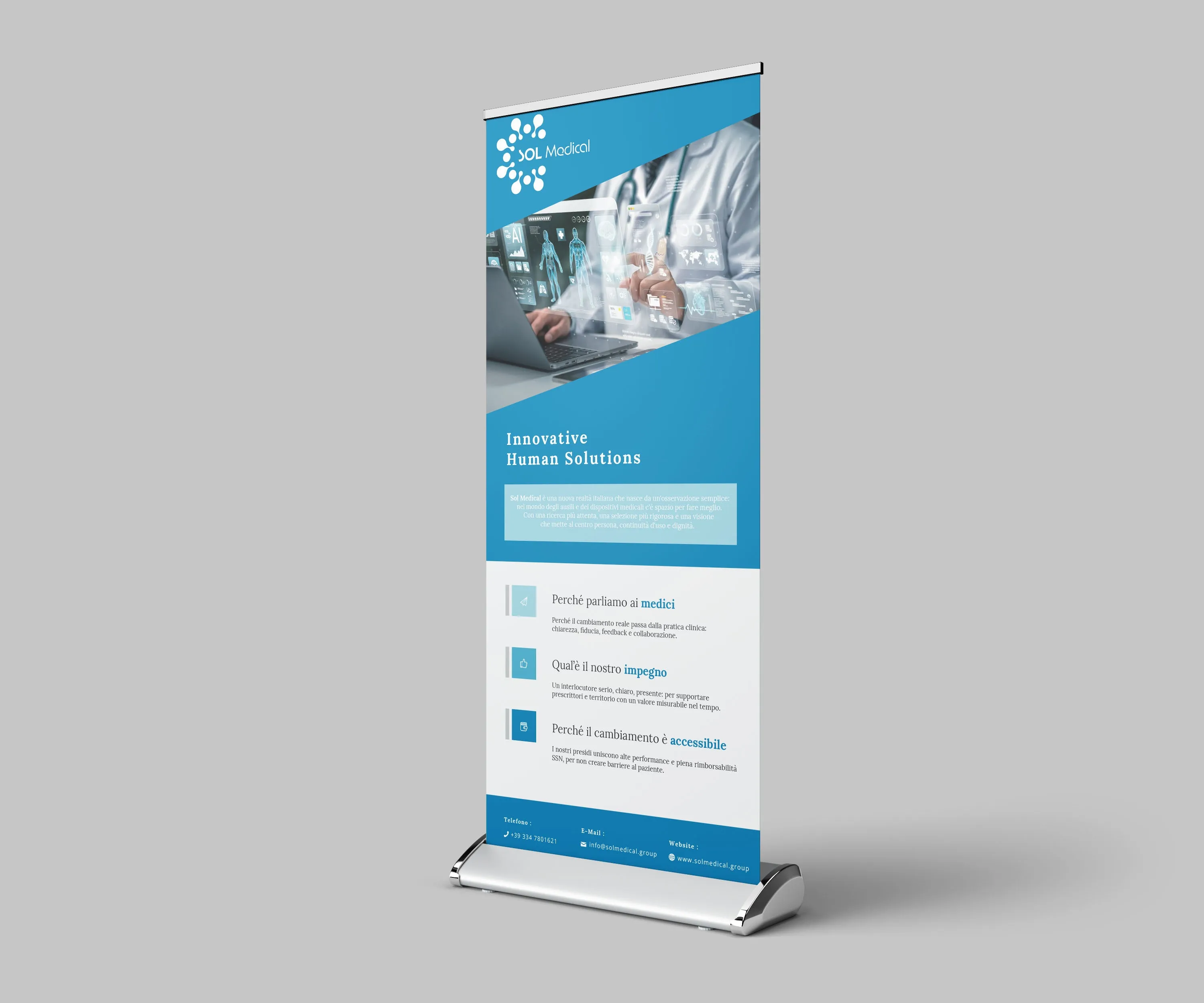 Mockup of the SOL Medical roll-up on its silver base: the white logo on cerulean, a photograph of a doctor at a laptop among floating screens, Innovative Human Solutions, a short presentation, three points on pale grey and a blue contact band